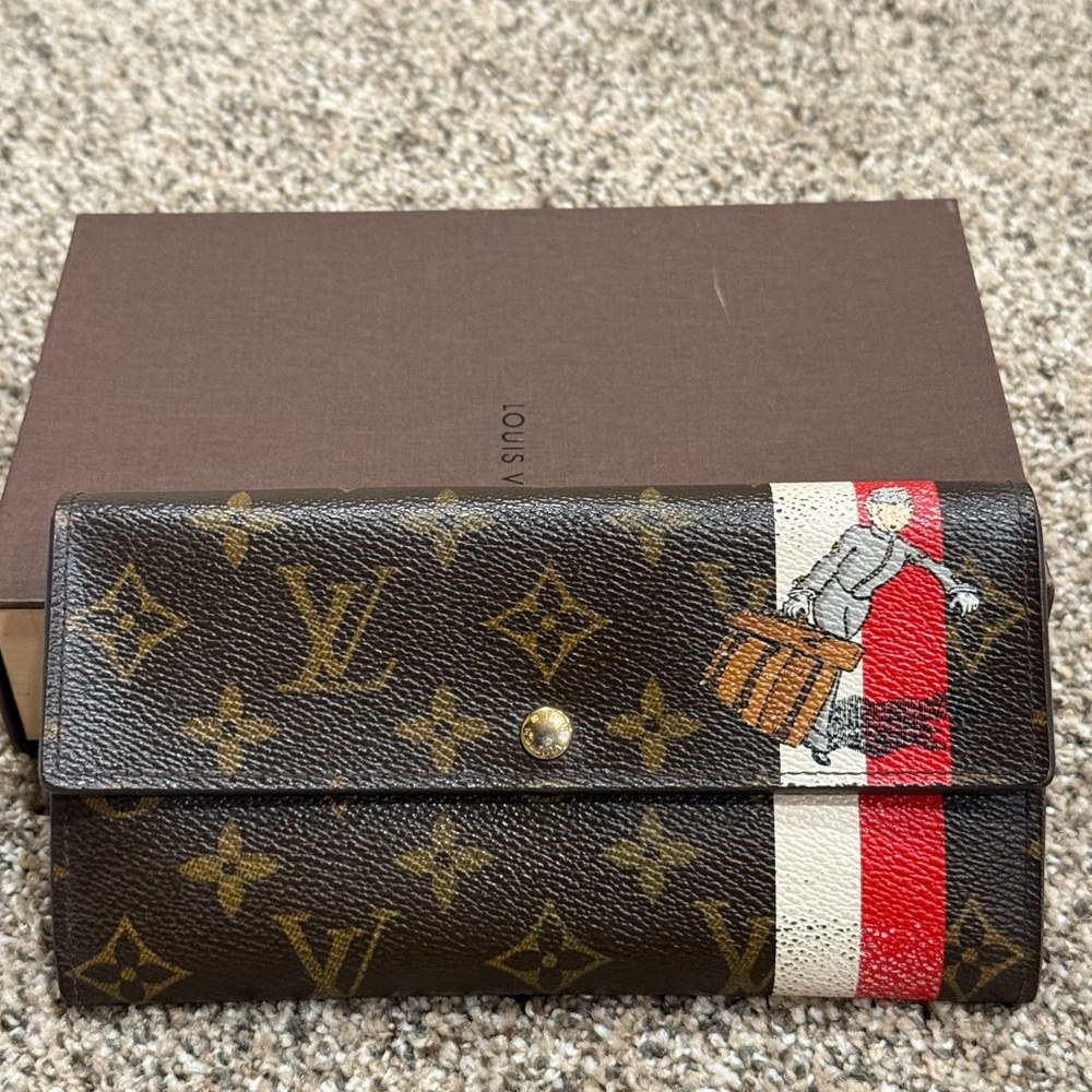 Louis Vuitton bell Boy Portefeuille monogram, limited edition, Sara wallet
